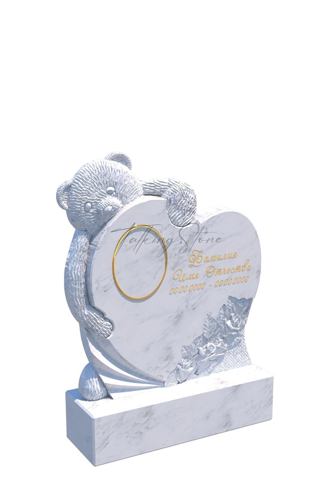 Памятник в виде сердца с выглядывающим сзади мишкой